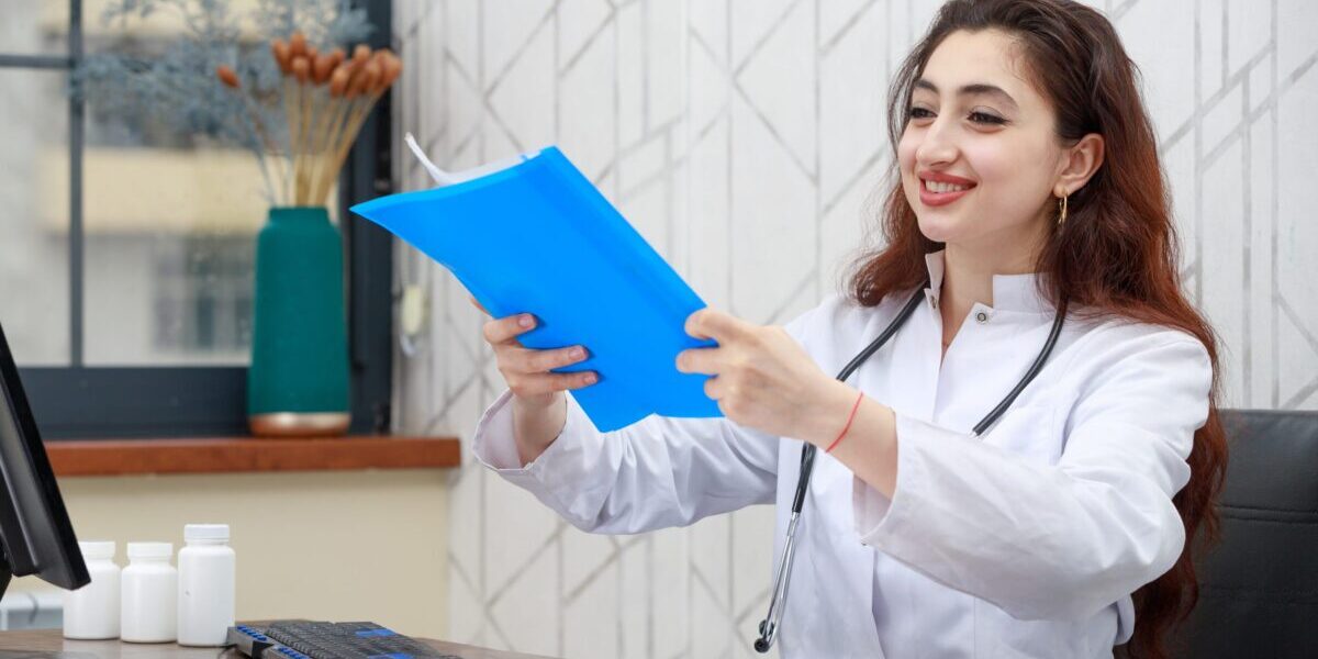 Portrait of young smiling health care worker holding analysis Outsourcing, Medical Billing, Healthcare