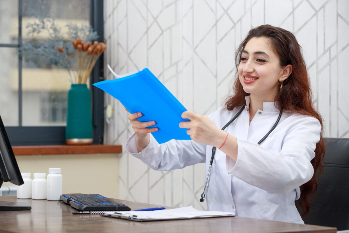Portrait of young smiling health care worker holding analysis Outsourcing, Medical Billing, Healthcare